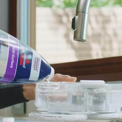 Pouring the cleaning solution