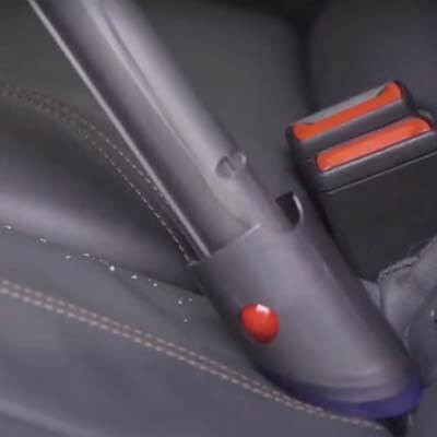 Dyson V15 Detect vacuuming the car