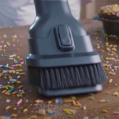 Samsung Jet 90 vacuuming with the small brush